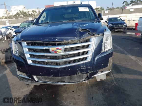2018 Cadillac Escalade z VIN 1GYS3AKJXJR126577, wystawiony jako IAAI lot #41225966 z przebiegiem 69 845 mil mil oraz . Historia ofert i sprzedaży dostępna na DreamBid. Obrazek 12.