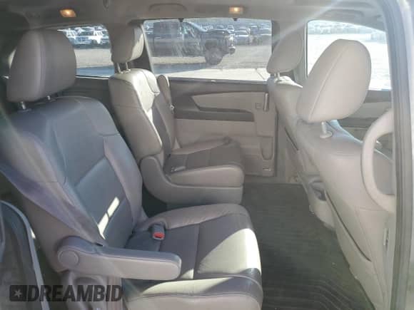 2013 Honda Odyssey EX-L z VIN 5FNRL5H65DB067849, wystawiony jako Copart lot #82080965 z przebiegiem 203 209 mil mil oraz Szkoda całkowita • Salvage title. Historia ofert i sprzedaży dostępna na DreamBid. Obrazek 11.