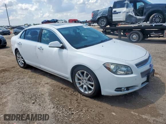 2012 Chevrolet Malibu LTZ z VIN 1G1ZG5E72CF286630, wystawiony jako Copart lot #71409355 z przebiegiem 124 448 mil mil oraz Szkoda całkowita • Salvage title. Historia ofert i sprzedaży dostępna na DreamBid. Obrazek 4.