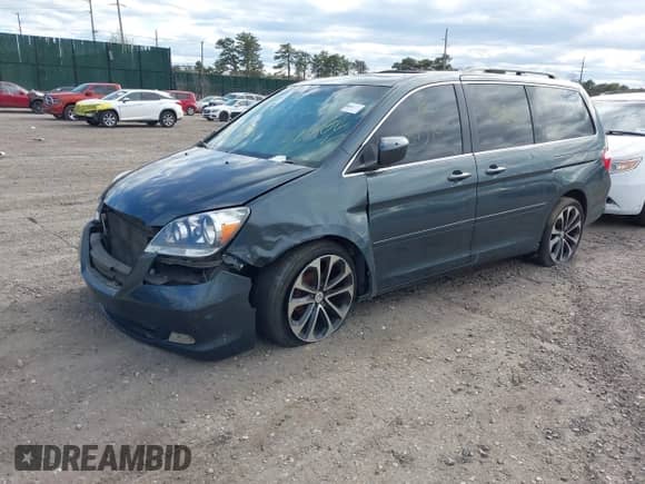 2006 Honda Odyssey Touring z VIN 5FNRL38896B083044, wystawiony jako IAAI lot #42061058 z przebiegiem Nie podano mil oraz . Historia ofert i sprzedaży dostępna na DreamBid. Obrazek 2.