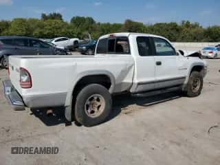 1999 Dodge Dakota SLT z VIN 1B7GG22Y0XS111610, wystawiony jako Copart lot #86594825 z przebiegiem 198 798 mil mil oraz Szkoda całkowita • Salvage title. Historia ofert i sprzedaży dostępna na DreamBid. Obrazek 3.