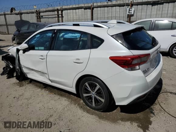 2022 Subaru Impreza Premium with VIN 4S3GTAD66N3703957, listed as a Copart auction lot 61875905 with 61,800 mi miles and Salvage title. Bid and sale history available at DreamBid. Image 2.