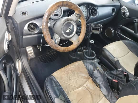 2006 MINI Hardtop S with VIN WMWRE33506TL19646, listed as a Copart auction lot 54614355 with Not provided miles and Salvage title. Bid and sale history available at DreamBid. Image 8.
