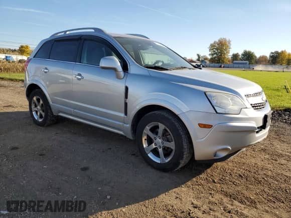2013 Chevrolet Captiva Sport LT with VIN 3GNAL3EK4DS594380, listed as a Copart auction lot 77171654 with 134,429 mi miles and Salvage title. Bid and sale history available at DreamBid. Image 4.