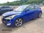 2012 Hyundai Veloster w/Black Int z VIN KMHTC6AD9CU054320, wystawiony jako IAAI lot #42750083 z przebiegiem 130 343 mil mil oraz . Historia ofert i sprzedaży dostępna na DreamBid. Obrazek 2.