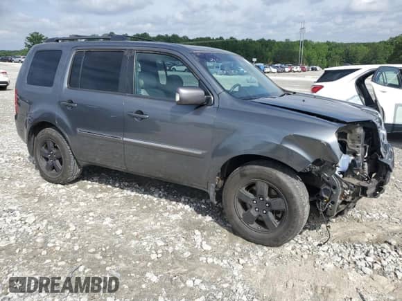 2011 Honda Pilot Touring с VIN 5FNYF3H98BB017185, выставлен на аукционе Copart как лот 68420775 с пробегом 204 719 миль миль и На запчасти • Non repairable. История ставок и продаж доступна на DreamBid. Изображение 4.