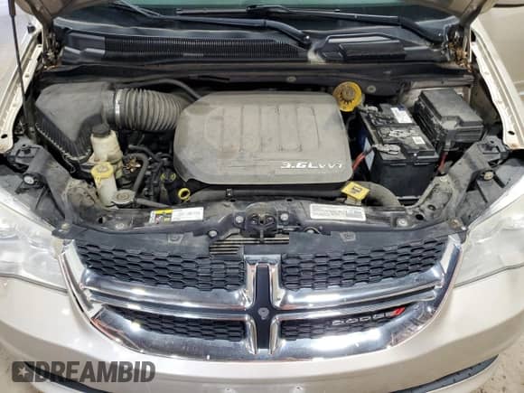 2014 Dodge Grand Caravan SXT with VIN 2C4RDGCG1ER253516, listed as a Copart auction lot 69698965 with 155,334 mi miles and Clean title. Bid and sale history available at DreamBid. Image 12.