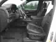 2022 Chevrolet Suburban LT with VIN 1GNSKCKD5NR124800, listed as a Copart auction lot 58847615 with 77,550 mi miles and Salvage title. Bid and sale history available at DreamBid. Image 7.