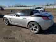 2009 Saturn Sky with VIN 1G8MB35B29Y104280, listed as a Copart auction lot 48437935 with 142,472 mi miles and Salvage title. Bid and sale history available at DreamBid. Image 2.