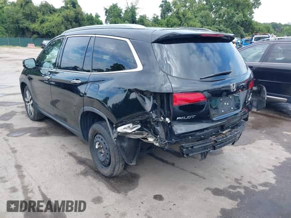 2017 Honda Pilot Touring z VIN 5FNYF6H96HB009726, wystawiony jako IAAI lot #42981867 z przebiegiem 106 056 mil mil oraz . Historia ofert i sprzedaży dostępna na DreamBid. Obrazek 3.