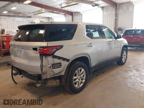 2022 Chevrolet Traverse LS with VIN 1GNERFKW3NJ114938, listed as a IAAI auction lot 42315272 with 43,544 mi miles and . Bid and sale history available at DreamBid. Image 4.
