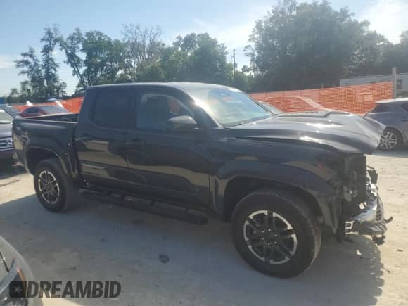 2024 Toyota Tacoma SR5 with VIN 3TMKB5FN5RM020760, listed as a Copart auction lot 61219275 with 4,143 mi miles and Non repairable. Bid and sale history available at DreamBid. Image 4.