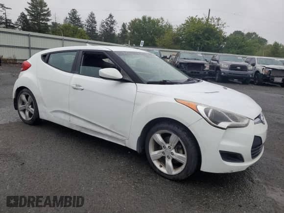 2013 Hyundai Veloster w/Black Int z VIN KMHTC6AD6DU180586, wystawiony jako Copart lot #81717425 z przebiegiem 91 070 mil mil oraz Szkoda całkowita • Salvage title. Historia ofert i sprzedaży dostępna na DreamBid. Obrazek 4.