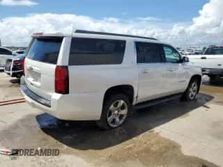 2020 Chevrolet Suburban LT z VIN 1GNSCHKC4LR167975, wystawiony jako Copart lot #62097105 z przebiegiem 98 771 mil mil oraz Czysty tytuł • Clean title. Historia ofert i sprzedaży dostępna na DreamBid. Obrazek 3.