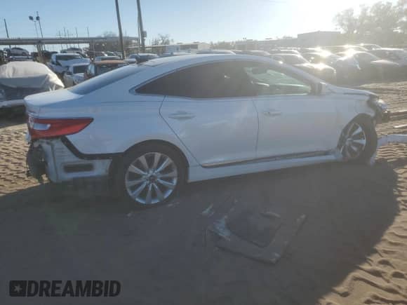 2016 Hyundai Azera Limited с VIN KMHFH4JG9GA569208, выставлен на аукционе Copart как лот 81810874 с пробегом 82 986 миль миль и Списание • Salvage title. История ставок и продаж доступна на DreamBid. Изображение 3.