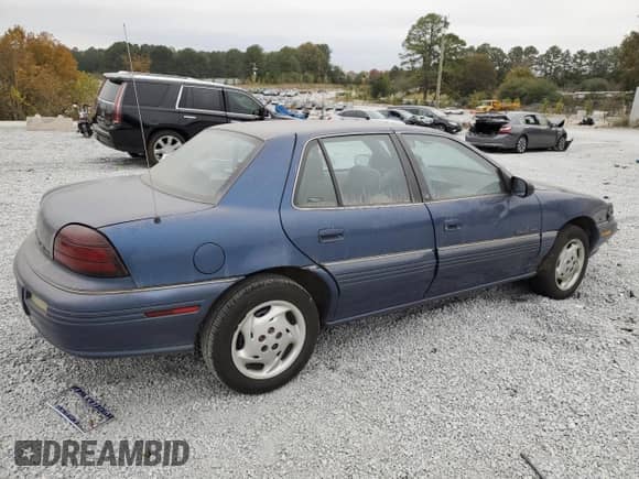 1995 Pontiac Grand Am с VIN 1G2NE55M1SC731915, выставлен на аукционе Copart как лот 77453774 с пробегом 170 080 миль миль и Списание • Salvage title. История ставок и продаж доступна на DreamBid. Изображение 3.