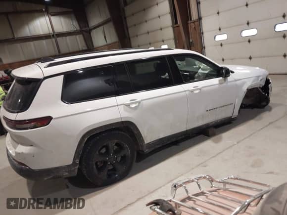 2023 Jeep Grand Cherokee Altitude with VIN 1C4RJKAG7P8701187, listed as a IAAI auction lot 41453016 with 44,961 mi miles and . Bid and sale history available at DreamBid. Image 4.