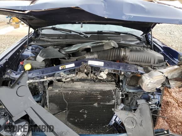 2013 Dodge Challenger SXT z VIN 2C3CDYAG7DH676527, wystawiony jako Copart lot #66930415 z przebiegiem 170 584 mil mil oraz Szkoda całkowita • Salvage title. Historia ofert i sprzedaży dostępna na DreamBid. Obrazek 11.