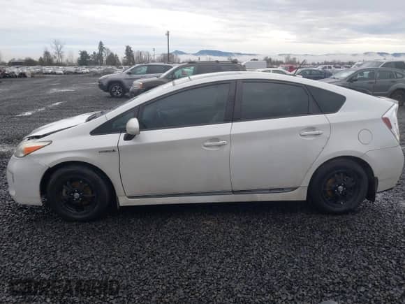 2012 Toyota Prius One with VIN JTDKN3DU6C1486594, listed as a IAAI auction lot 41654136 with 261,107 mi miles and . Bid and sale history available at DreamBid. Image 14.