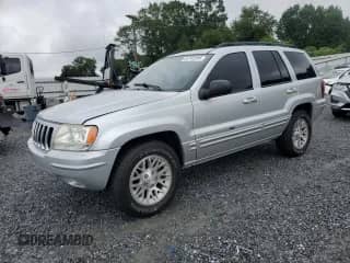 2002 Jeep Grand Cherokee Limited with VIN 1J4GW58N52C270265, listed as a Copart auction lot 62102395 with 168,656 mi miles and Salvage title. Bid and sale history available at DreamBid. Image 1.