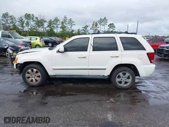 2008 Jeep Grand Cherokee Limited with VIN 1J8HR58268C208236, listed as a IAAI auction lot 43410178 with 233,232 mi miles and . Bid and sale history available at DreamBid. Image 15.