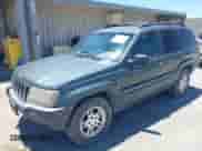 2003 Jeep Grand Cherokee Laredo z VIN 1J4GX48S03C609724, wystawiony jako IAAI lot #42783828 z przebiegiem 226 965 mil mil oraz . Historia ofert i sprzedaży dostępna na DreamBid. Obrazek 2.