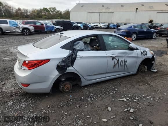 2012 Hyundai Accent GLS z VIN KMHCU4AE1CU234062, wystawiony jako Copart lot #87417015 z przebiegiem Nie podano mil oraz Szkoda całkowita • Salvage title. Historia ofert i sprzedaży dostępna na DreamBid. Obrazek 3.