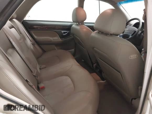 2002 Hyundai XG L z VIN KMHFU45EX2A180204, wystawiony jako IAAI lot #41472564 z przebiegiem 148 333 mil mil oraz . Historia ofert i sprzedaży dostępna na DreamBid. Obrazek 8.