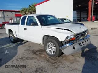 2003 Dodge Dakota with VIN 1D7HL12X13S319223, listed as a IAAI auction lot 42512419 with 286,021 mi miles and . Bid and sale history available at DreamBid. Image 1.