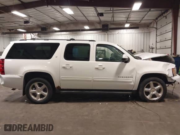 2010 Chevrolet Suburban LT z VIN 1GNUKJE32AR272865, wystawiony jako IAAI lot #43260380 z przebiegiem 167 294 mil mil oraz . Historia ofert i sprzedaży dostępna na DreamBid. Obrazek 14.