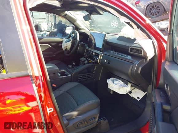 2024 Toyota Tacoma SR5 with VIN 3TYLB5JN1RT001686, listed as a IAAI auction lot 41071582 with 5,986 mi miles and . Bid and sale history available at DreamBid. Image 5.