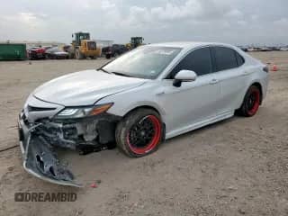 2021 Toyota Camry Hybrid XSE with VIN 4T1K31AK7MU028992, listed as a Copart auction lot 65379895 with 62,735 mi miles and Salvage title. Bid and sale history available at DreamBid. Image 1.