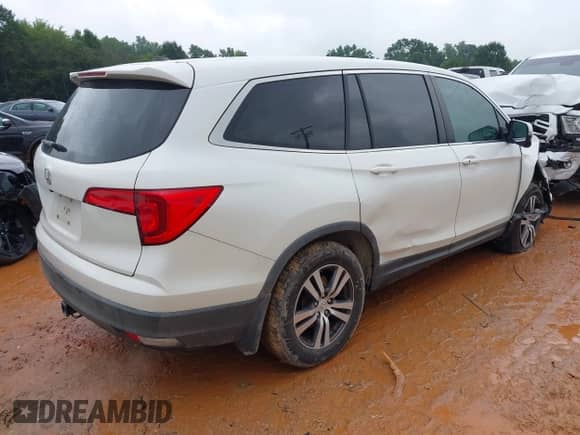 2017 Honda Pilot EX-L with VIN 5FNYF5H67HB011517, listed as a IAAI auction lot 42935807 with 193,191 mi miles and . Bid and sale history available at DreamBid. Image 4.