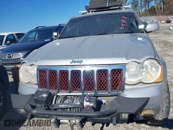 2009 Jeep Grand Cherokee with VIN 1J8HR68T39C540795, listed as a IAAI auction lot 41379112 with 236,624 mi miles and . Bid and sale history available at DreamBid. Image 12.