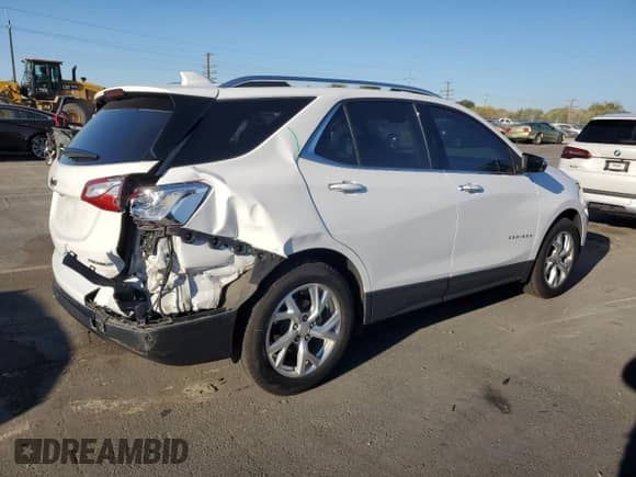 2021 Chevrolet Equinox Premier с VIN 3GNAXNEV5MS152623, выставлен на аукционе Copart как лот 85684635 с пробегом 74 488 миль миль и Списание • Salvage title. История ставок и продаж доступна на DreamBid. Изображение 3.