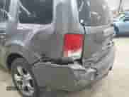 2014 Honda Pilot EX-L z VIN 5FNYF4H52EB024950, wystawiony jako IAAI lot #42874943 z przebiegiem 164 315 mil mil oraz . Historia ofert i sprzedaży dostępna na DreamBid. Obrazek 6.