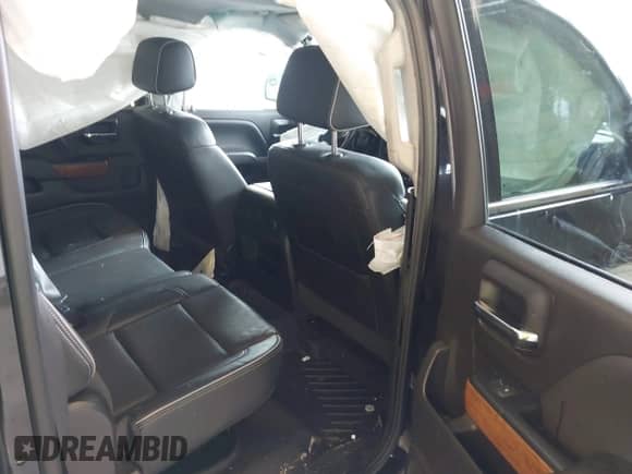 2017 Chevrolet Silverado 1500 High Country with VIN 3GCUKTECXHG409985, listed as a IAAI auction lot 43304925 with 179,299 mi miles and . Bid and sale history available at DreamBid. Image 8.