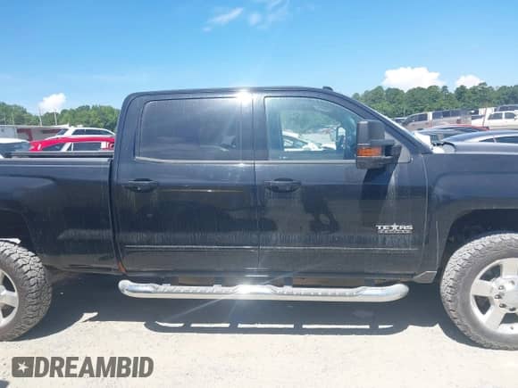 2016 Chevrolet Silverado 2500HD LT z VIN 1GC1KVEG9GF296399, wystawiony jako IAAI lot #42742189 z przebiegiem 127 470 mil mil oraz . Historia ofert i sprzedaży dostępna na DreamBid. Obrazek 13.