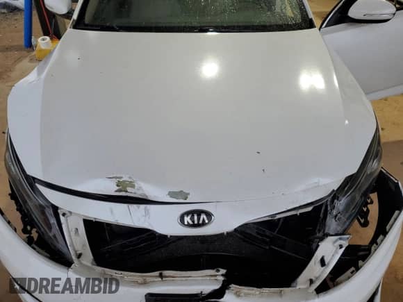 2014 Kia Optima LX с VIN KNAGM4A73E5475543, выставлен на аукционе Copart как лот 72706484 с пробегом 124 533 миль миль и Списание • Salvage title. История ставок и продаж доступна на DreamBid. Изображение 12.