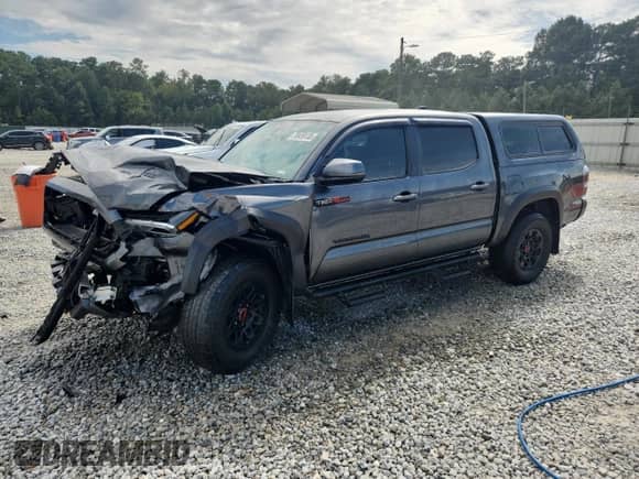 2023 Toyota Tacoma SR с VIN 3TMCZ5AN1PM558196, выставлен на аукционе Copart как лот 70459135 с пробегом 20 863 миль миль и Списание • Salvage title. История ставок и продаж доступна на DreamBid. Изображение 1.