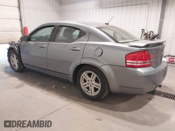 2010 Dodge Avenger R/T with VIN 1B3CC5FB2AN164818, listed as a IAAI auction lot 43230953 with 165,249 mi miles and . Bid and sale history available at DreamBid. Image 3.