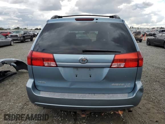 2005 Toyota Sienna LE with VIN 5TDBA23C05S032202, listed as a Copart auction lot 86481275 with 214,786 mi miles and Salvage title. Bid and sale history available at DreamBid. Image 6.