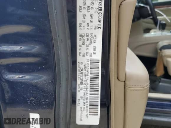 2012 Jeep Grand Cherokee Limited z VIN 1C4RJFBT2CC274320, wystawiony jako Copart lot #59861565 z przebiegiem 141 626 mil mil oraz Szkoda całkowita • Salvage title. Historia ofert i sprzedaży dostępna na DreamBid. Obrazek 14.