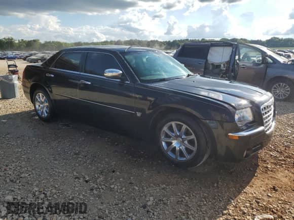 2007 Chrysler 300 C with VIN 2C3LA63H57H765570, listed as a Copart auction lot 65699425 with 180,116 mi miles and Salvage title. Bid and sale history available at DreamBid. Image 4.