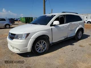 2016 Dodge Journey SXT with VIN 3C4PDCBB7GT156584, listed as a Copart auction lot 58920085 with 132,385 mi miles and Salvage title. Bid and sale history available at DreamBid. Image 1.