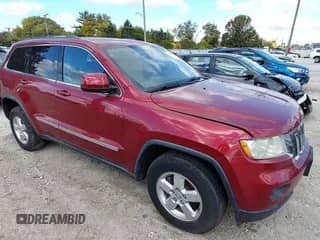 2012 Jeep Grand Cherokee Laredo with VIN 1C4RJFAGXCC256023, listed as a IAAI auction lot 43587897 with 199,803 mi miles and . Bid and sale history available at DreamBid. Image 1.