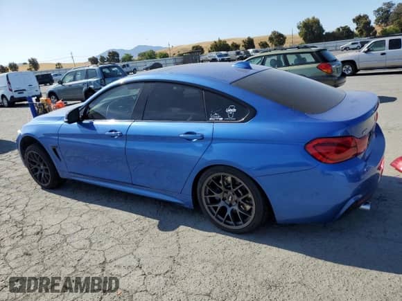 2015 BMW 4 Series 435i xDrive with VIN WBA4B3C55FD670176, listed as a Copart auction lot 57847755 with 143,427 mi miles and Salvage title. Bid and sale history available at DreamBid. Image 2.