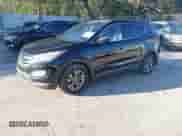 2014 Hyundai Santa Fe with VIN 5XYZU3LB3EG137347, listed as a IAAI auction lot 43476896 with 177,018 mi miles and . Bid and sale history available at DreamBid. Image 2.
