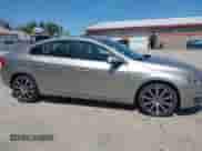 2015 Volvo S60 T5 Drive-E Premier with VIN YV126MFB8F2302747, listed as a IAAI auction lot 42247878 with 95,591 mi miles and . Bid and sale history available at DreamBid. Image 14.