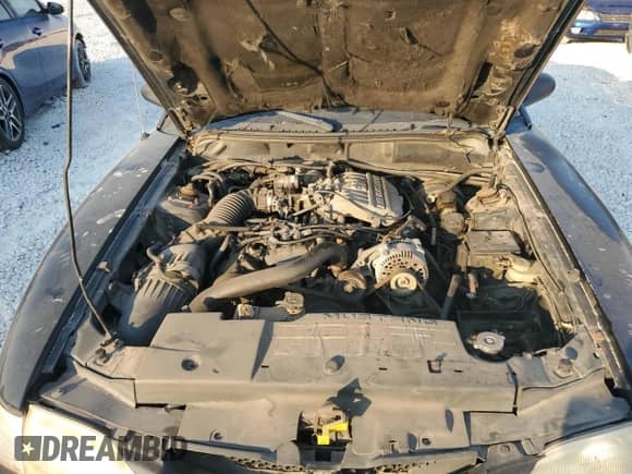 1996 Ford Mustang z VIN 1FALP4042TF200713, wystawiony jako Copart lot #75570054 z przebiegiem 172 210 mil mil oraz Czysty tytuł • Clean title. Historia ofert i sprzedaży dostępna na DreamBid. Obrazek 11.